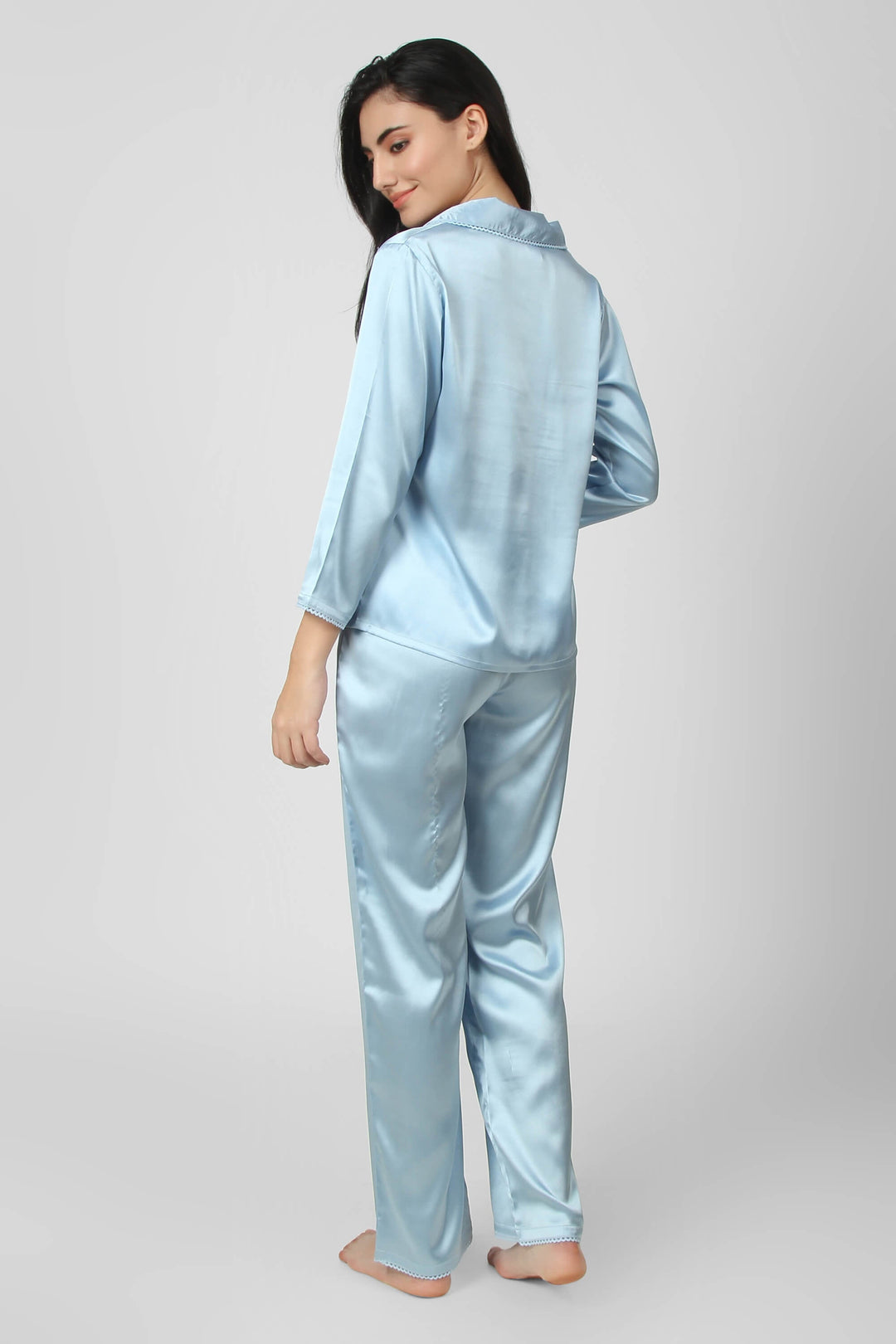 Dani Pyjama Suit in soft blue satin with long sleeves and pants.
